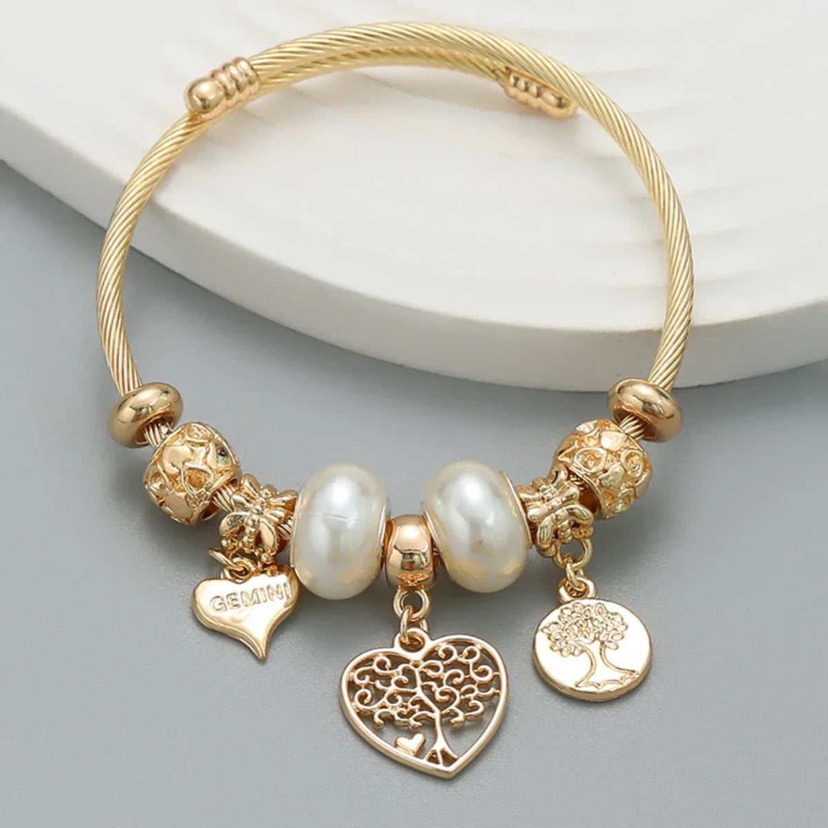 Fashion Multi Element Stainless Steel Panadora - Palm and Thread