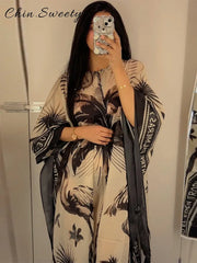 Elegant Printed Long Pleated Dress - Palm and Thread